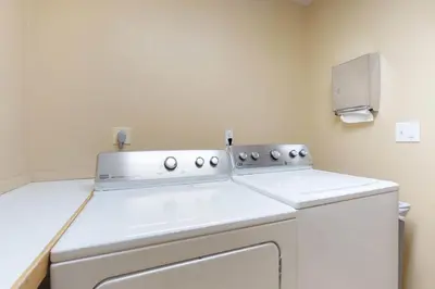 a laundry room with a washer and dryer at 2914 River Bank Lodge - Keystone in Keystone