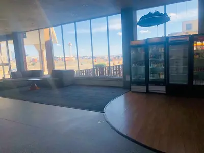 a room with a view of a building with windows at Budget Inn Denver Downtown in Denver