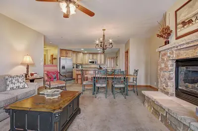 a living room with a couch and a fireplace at 3069 Timbers Condo in Keystone