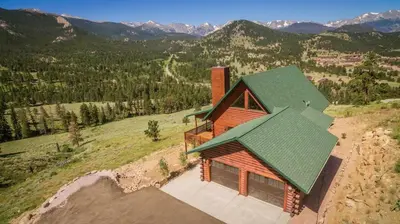 an overhead view of a house with a green roof at Armstrong Home in Estes Park