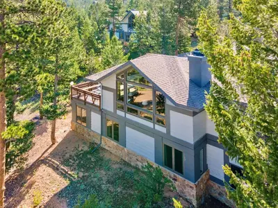 an overhead view of a white house with trees at Werlein Condominium 4 Bedroom condo in Estes Park