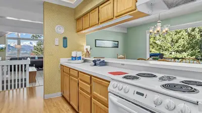 a kitchen with a stove and a counter top at Werlein Condominium 4 Bedroom condo in Estes Park