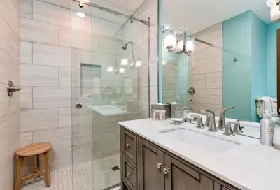 a bathroom with a sink and a shower at Stevenson Home in Estes Park