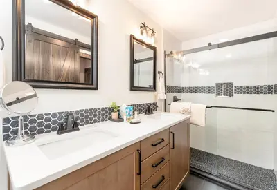 a bathroom with a sink and a shower at Alleman North Condominium 3 Bedroom condo in Estes Park