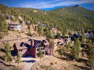 an aerial view of a home in the mountains at Awestruck Home in Estes Park