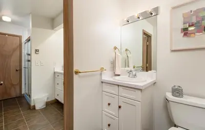 a bathroom with a sink and a toilet at Adams Condominium 2 Bedroom condo in Estes Park