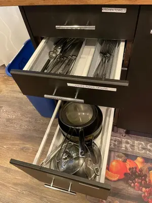 a drawer with a pot and pans in it at Launch Pad 2 Denver, Boulder & Mountains in Lafayette