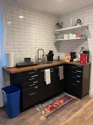 a kitchen with a sink and a counter top at Launch Pad 2 Denver, Boulder & Mountains in Lafayette