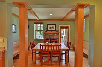 a dining room with a table and chairs at Luxury in Downtown Winter Park СО in Winter Park