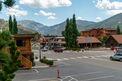 a town in the mountains with a parking lot at Spirit Lake Lodge in Grand Lake