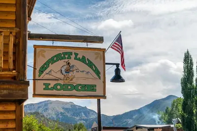 a sign for a craft hung on the side of a building at Spirit Lake Lodge in Grand Lake