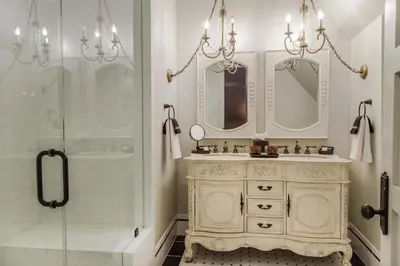 a bathroom with a sink and a shower at Patterson Inn in Denver