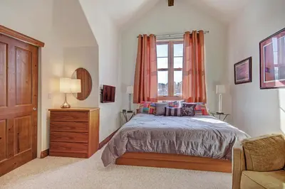 a bedroom with a bed and a window at Highland Greens Lodge 305 Condo in Breckenridge