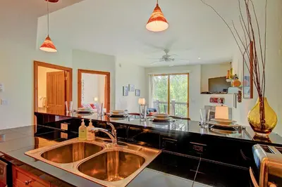 a kitchen with a sink and a counter top at Highland Greens Lodge 305 Condo in Breckenridge