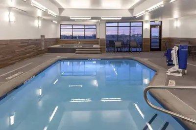 a large swimming pool in a hotel room at Fairfield Inn & Suites by Marriott Fort Collins South in Fort Collins