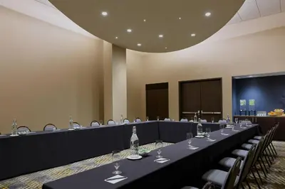 a conference room with a long table and chairs at SpringHill Suites by Marriott Denver Downtown in Denver