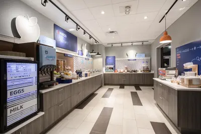 an apple store with counters and a food court at Holiday Inn Express & Suites - Denver NE - Brighton by IHG in Brighton