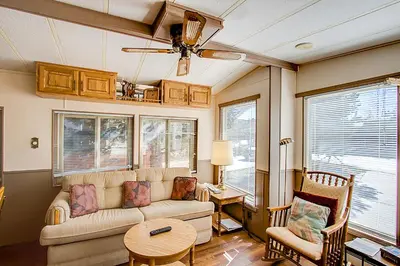 a living room with a couch and a table at #244 in Breckenridge