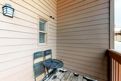 a table on the porch of a house at Lagoon 737C in Frisco