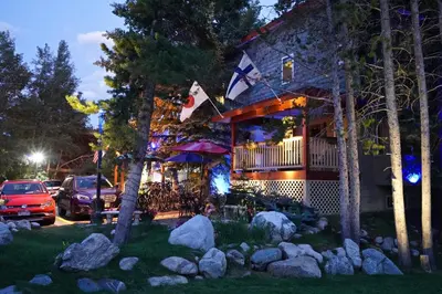 a house with a flag on it at night at Frisco Inn on Galena in Frisco