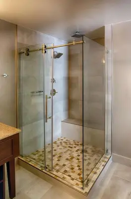 a shower with a glass door in a bathroom at DoubleTree by Hilton Denver/Westminister in Westminster
