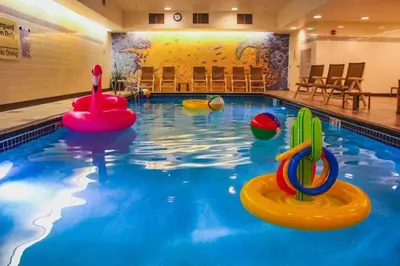 a pool with two inflatables in the water at Hampton Inn & Suites Denver-Downtown in Denver