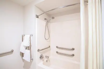 a bathroom with a shower and a sink at La Quinta by Wyndham Denver Englewood Tech Ctr in Greenwood Village