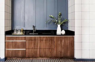 a kitchen with a sink and a vase with flowers at Kimpton Hotel Monaco Denver by IHG in Denver