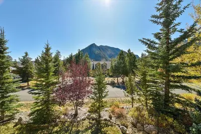 an autumn view of a house with a mountain at Larson Lane 217 Home in Frisco