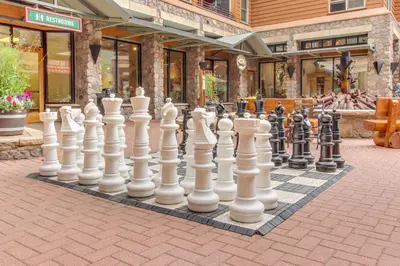 a giant chessboard in front of a building at Ogren Overlook in Keystone