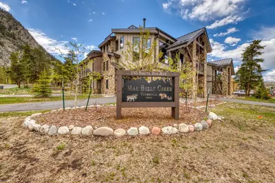 a sign in front of a building at 2nd Ave Luxury in Frisco