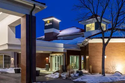 a hotel in the snow at night at La Quinta by Wyndham Denver Boulder - Louisville in Louisville