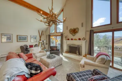a living room filled with furniture and a fireplace at Forest Feeling in Dillon