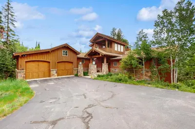 a house with a driveway in front of it at Easy Bend Elegance in Silverthorne