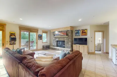 a large living room with a large brown leather couch at Easy Bend Elegance in Silverthorne