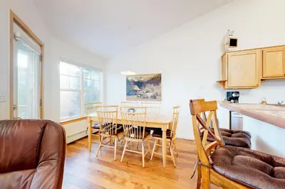 a kitchen and dining room with a table and chairs at Gore Trail Getaway in Silverthorne