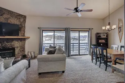 a living room with a couch and a table and a fireplace at 303D Dillon Bay Condo Condo in Dillon