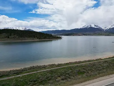 a view of a lake with mountains in the background at 303D Dillon Bay Condo Condo in Dillon