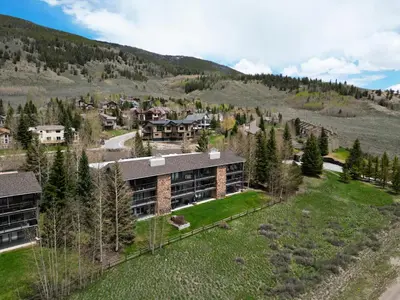 an aerial view of a building in the mountains at 303D Dillon Bay Condo Condo in Dillon