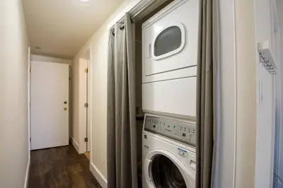a laundry room with a washer and dryer at Crestview Place Unit 507 in Winter Park
