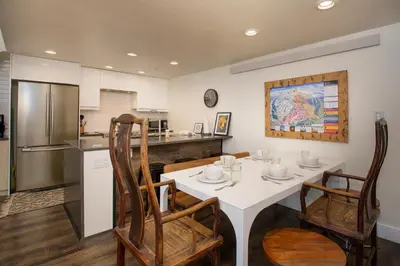 a kitchen and dining room with a table and chairs at Crestview Place Unit 507 in Winter Park