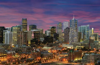 a nighttime view of a large city at night at Four Seasons Hotel Denver in Denver
