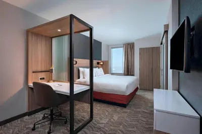 a hotel room with a bed and a desk at SpringHill Suites by Marriott Denver West/Golden in Lakewood