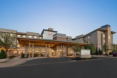 a large building with a sign in front of it at Residence Inn Denver Cherry Creek in Denver