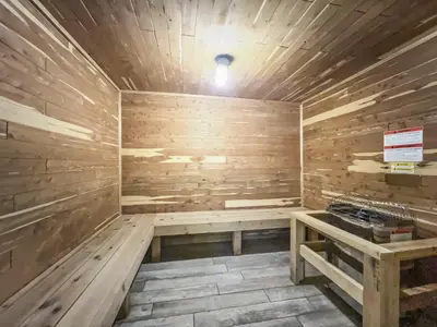 a wooden sauna with a bench in the middle at 112 Marina Place Condo in Dillon