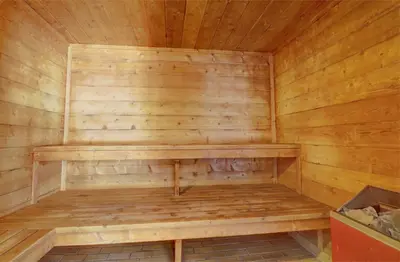 a wooden sauna with a wooden bench in it at 112 Marina Place Condo in Dillon