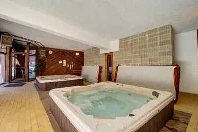 a jacuzzi tub in the middle of a room at 112 Marina Place Condo in Dillon
