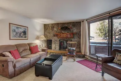 a living room with a couch and a fireplace at 112 Marina Place Condo in Dillon