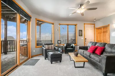 a living room with a couch and chairs at Nakai Peak 41B Condo in Estes Park