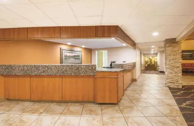 a lobby with a reception desk in a building at Mountain Valley Inn & Suites in Silverthorne
